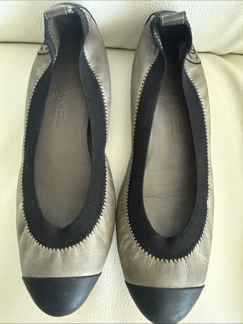 CHANEL Leather Gary and Black Cap-Toe Ballet FlatsToe Ballet Flats